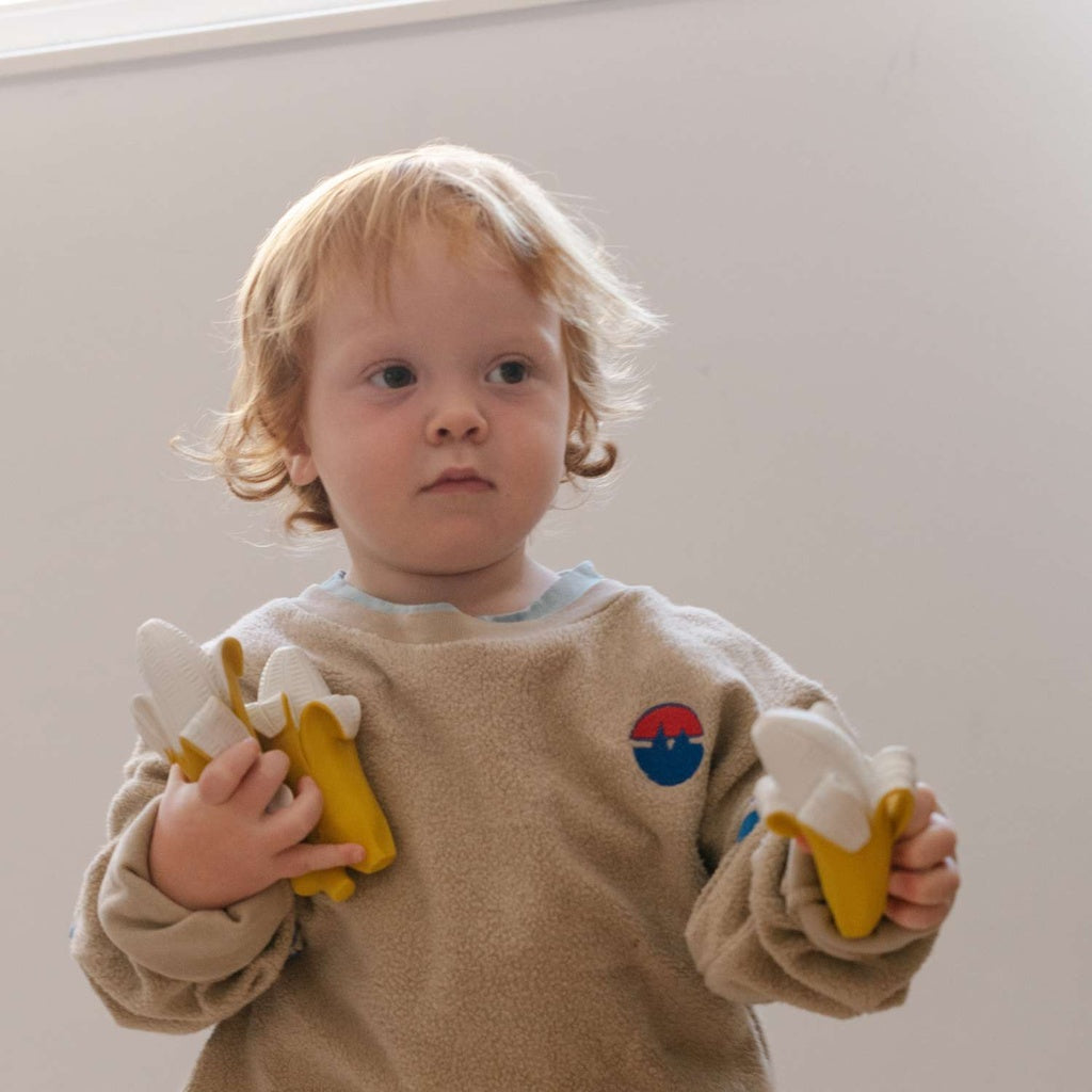 Jucărie dentiție bebeluși din cauciuc natural Ana Banana Oli and Carol